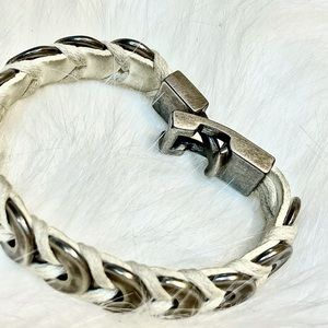 White/cream woven leather bracelet with silver toned washer shaped pieces
